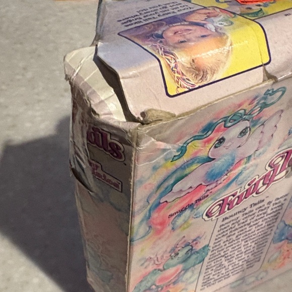 Hasbro Fairy Tails Fuzzy Tummies Blue and Yellow Toy - Picture 2 of 7